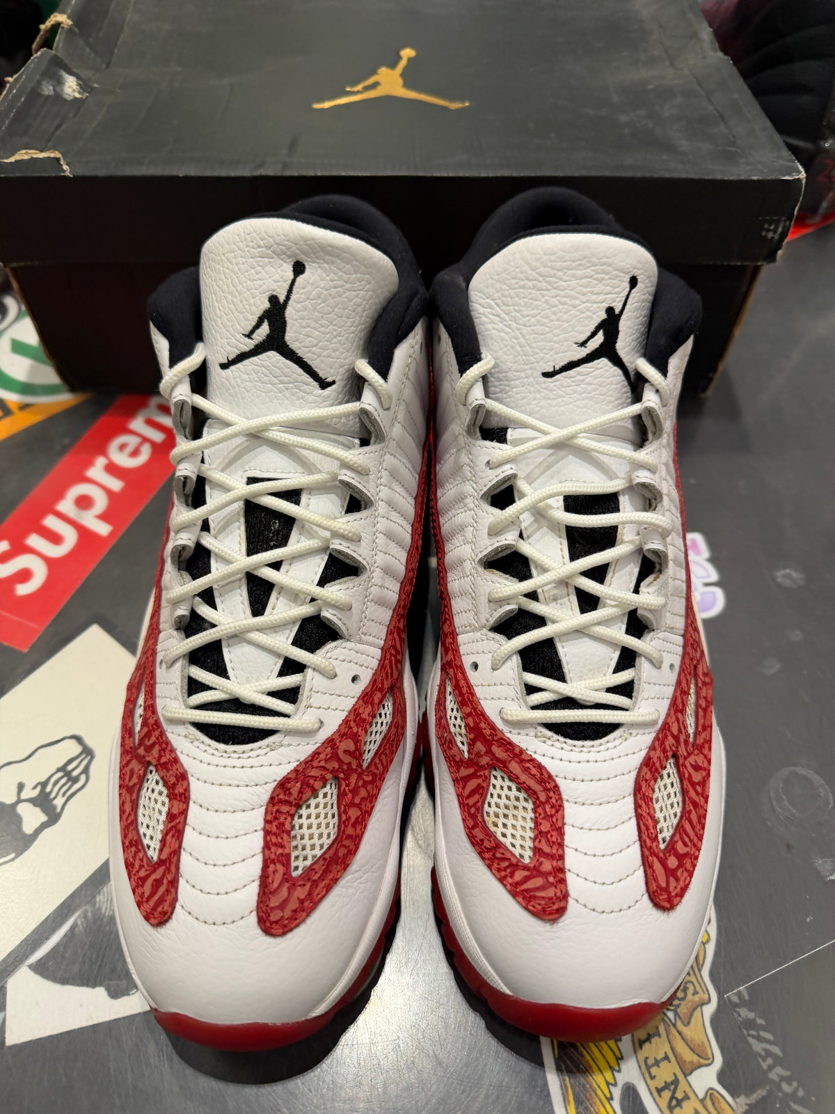 Jordan 11 low IE Gym red