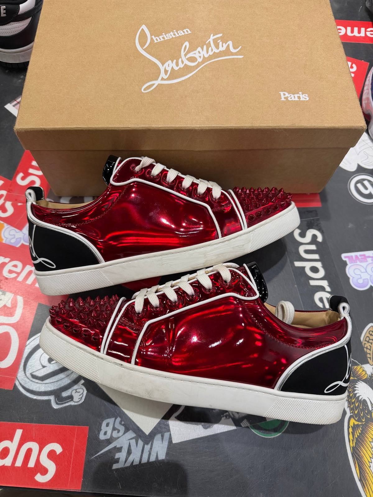 Christian Louboutin Red bottoms metallic red