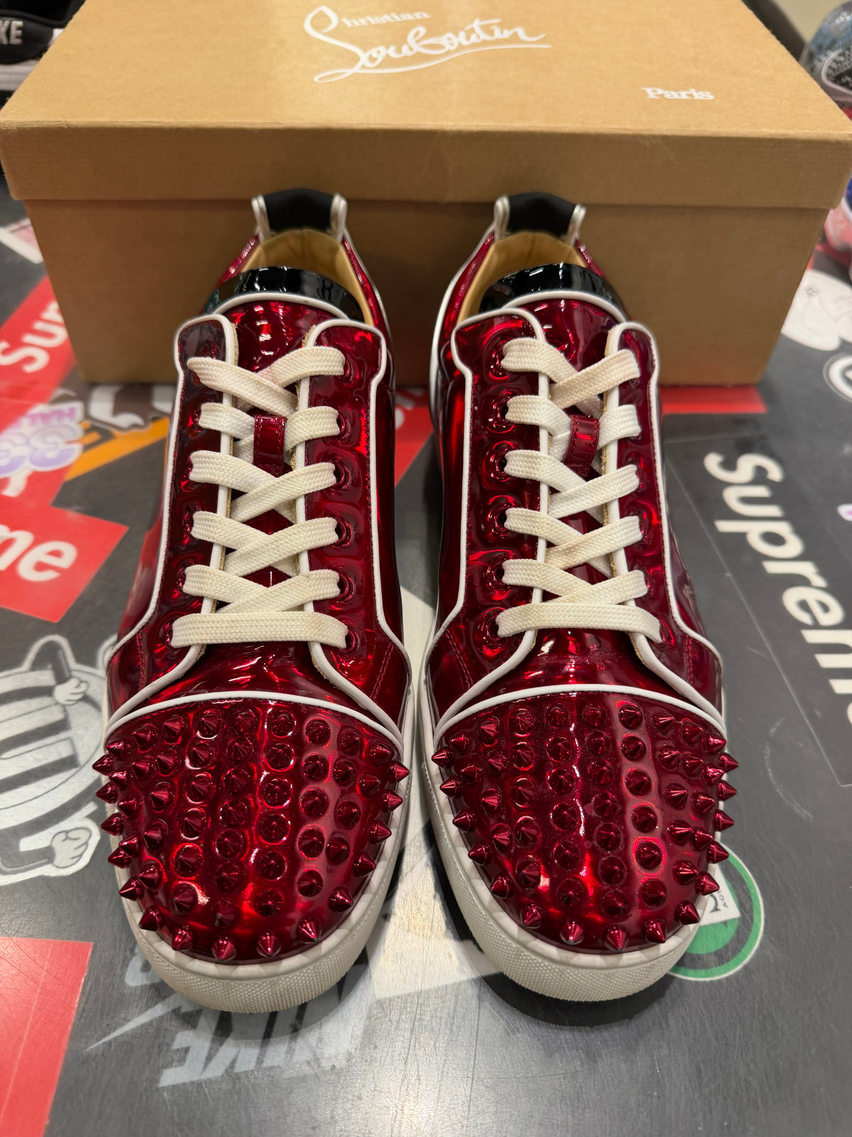 Christian Louboutin Red bottoms metallic red
